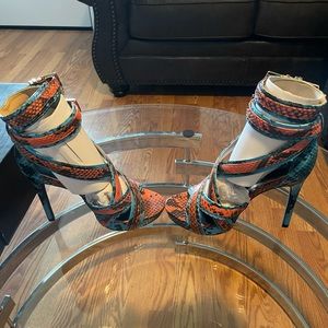 Brand new, size 8 orange and turquoise heels.